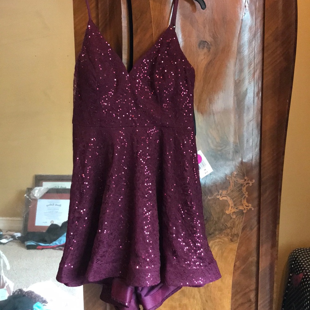 Cocktail dress still with tags! Never worn.